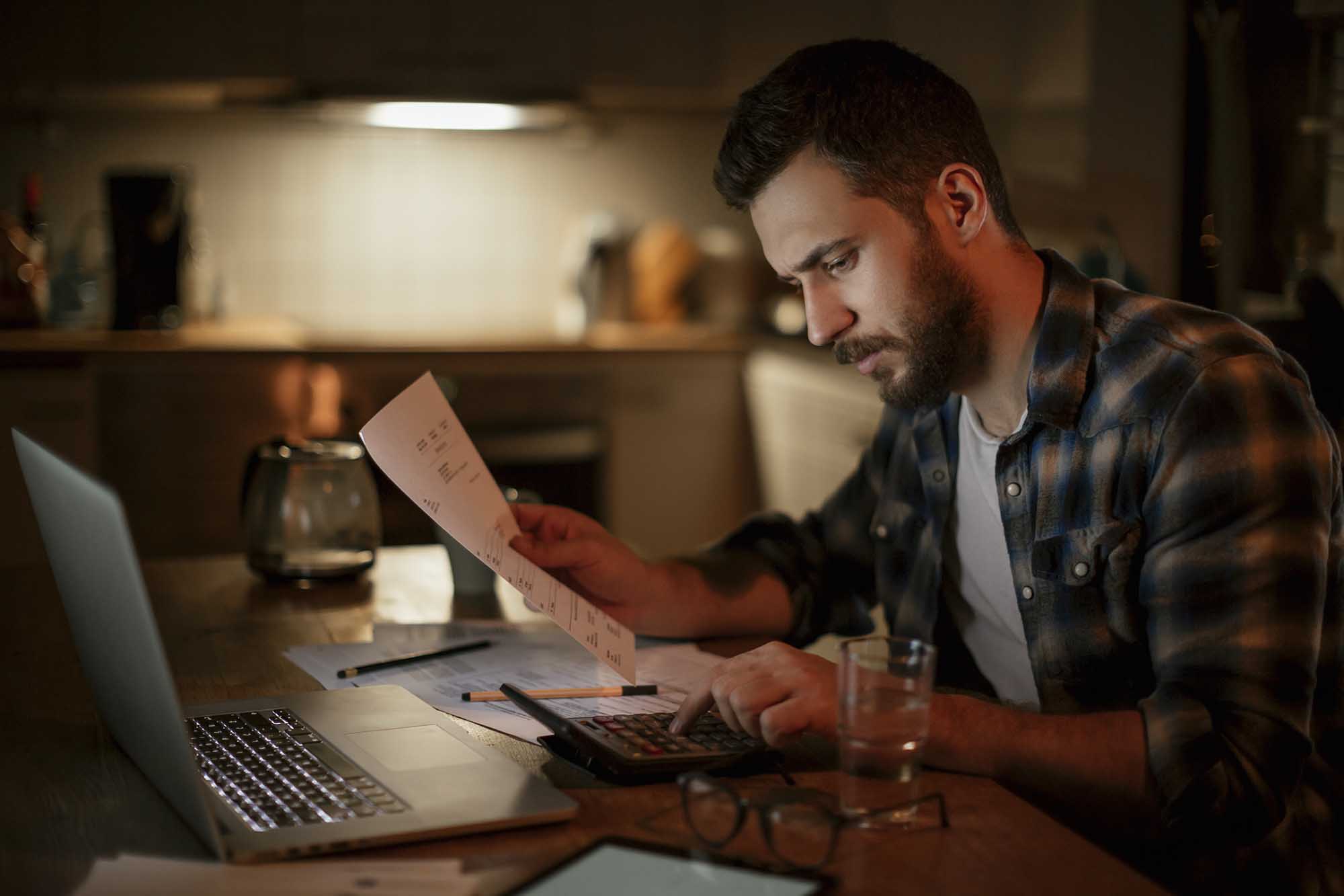 Guy reviewing his student loan problems